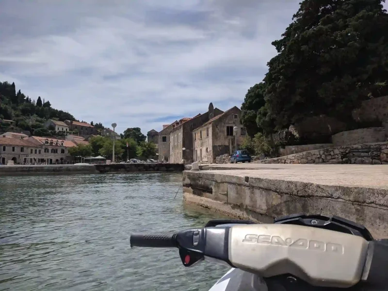 Private boat near Dubrovnik’s historic walls.
